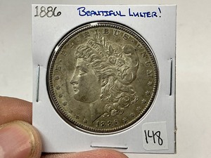 lot 148 image: 1886 Morgan Silver Dollar