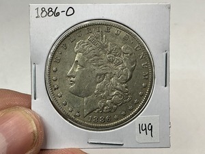 lot 149 image: 1886-O Morgan Silver Dollar