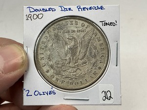 lot 212 image: 1900 2 Olives Morgan Silver Dollar