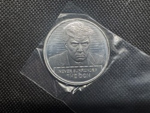 lot 74 image: BU One Ounce .999 Silver Donald J. Trump Never Surrender Round