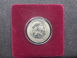 lot 84 image: 1953-D Brilliant Uncirculated Silver Franklin Half Dollar