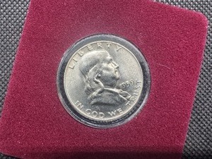 lot 86 image: 1959-D Brilliant Uncirculated Silver Franklin Half Dollar