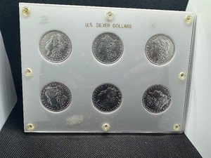 Six Uncirculated New Orleans Mint Morgan Dollars in a Capital Holder: 1898-O; 1899-O; 1900-O; 1901-O; 1902-O; and 1904-O - Beautiful Coins - Extreme Mint Luster!