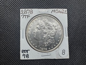 lot 8 image: 1878 7TF Morgan Silver Dollar Marked MS62 When Purchased