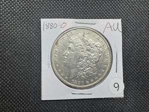 lot 9 image: 1880-O Morgan Silver Dollar Marked AU When Purchased