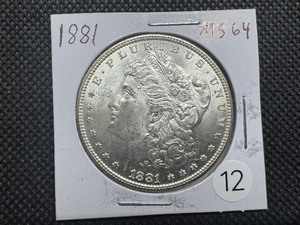 lot 12 image: 1881 Morgan Silver Dollar Marked MS64 When Purchased