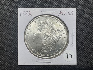 lot 15 image: 1882 Morgan Silver Dollar Marked MS65 When Purchased - Nice Mint Luster