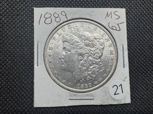 lot 21 image: 1889 Morgan Silver Dollar Marked MS65 When Purchased - Nice Mint Luster