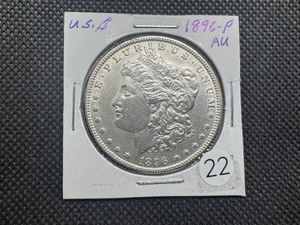 lot 22 image: 1896 Morgan Silver Dollar Marked AU When Purchased - Clean Blast White Coin