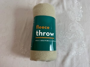 lot 142 image: Beige Fleece Throw 60 x 50