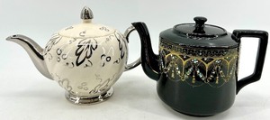 lot 48 image: Vintage Teapots Pair - Black Gold Gilded Teapot & Ivory Cream Teapot