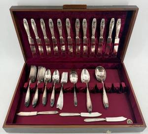 lot 29 image: 1847 Rogers Bros Silver Plate Flatware Set in Wood Case with Burgundy Interior