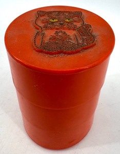 lot 239 image: Stacking Orange Plastic Storage Container & Cracker Jack Charms