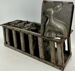 lot 6 image: Vintage Antique Metal Bunny Chocolate Molds in Rustic Rack