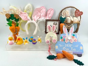 lot 84 image: Easter Bunny Decor Assortment - Plush Bunnies, Carrot Plush, Ducks & Cross-Stitch Art