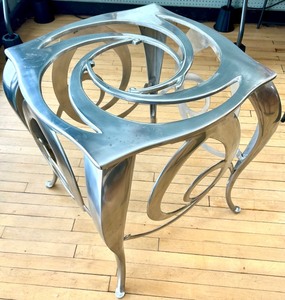 lot 130 image: Sculptural Metal Console Table with Circular Ring Motif