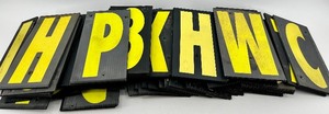lot 282 image: Channel Letter Sign Letters A-Z 0-9 & Yellow on Black Panels