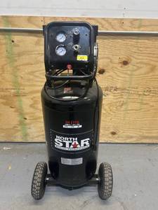 lot 12 image: NorthStar Portable Quiet Electric Air Compressor, 1.5 HP, 26 Gallons, 4 SCFM  90 PSI MSRP $599.99