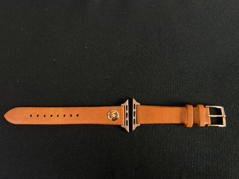 lot 124 image: Michael Kors leather Apple Watch band