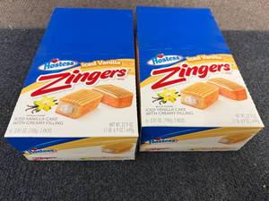 lot 157 image: 2 Packs Of Hostess Iced Vanilla Zingers