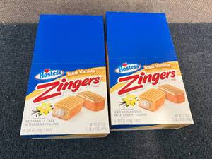 lot 160 image: 2 Packs Of Hostess Iced Vanilla Zingers