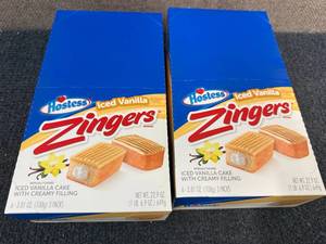 lot 161 image: 2 Packs Of Hostess Iced Vanilla Zingers