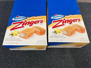 lot 162 image: 2 Packs Of Hostess Iced Vanilla Zingers
