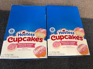 lot 164 image: 2 Packs Of Hostess Frosted Sugar Cookie Cupcakes
