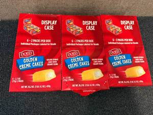 lot 166 image: 3 Display Cases Of Dolly Golden Cr�me Cakes