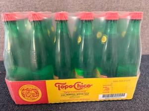 lot 189 image: 12 Pack Of Topo Chico Grapefruit