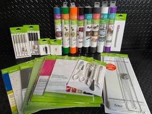 lot 110 image: Cricut Explore Vinyl & Accessories Bundle - Vinyl Rolls, Pens, Trimmer, Scissors