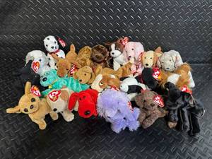 lot 126 image: The Beanie Babies Collection Ty Inc. Assorted Dog Plush Toys - Mixed Breeds