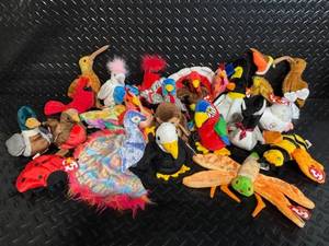 lot 132 image: TY Beanie Babies Collection - Assorted Plush Beanies with Birth Tags (Glow Baldy Jabber Early Lucky Flashy)
