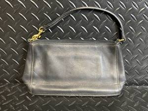lot 147 image: Coach Leather Wristlet Clutch - Black Leather, Gold Hardware