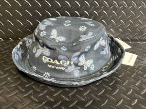 lot 150 image: Coach CH394 Navy Butterfly-Print Bucket Hat