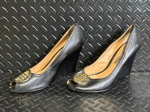 lot 156 image: Audrey Brooke Black Leather Peep-Toe Wedge Heels - Gold Circular Medallion Toe Emblem