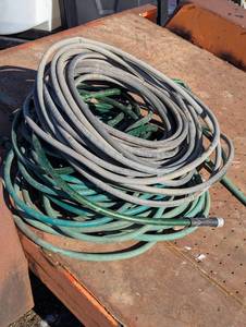 lot 139 image: Large Pile of Garden Hoses