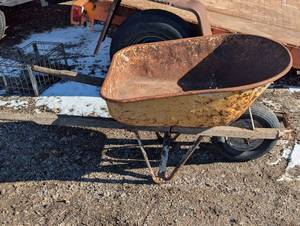 lot 154 image: Metal Wheelbarrow - Yellow