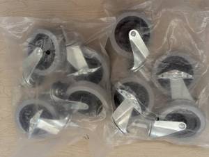 lot 32 image: 8 Medium PolyRubber Wheels for CartsRacks