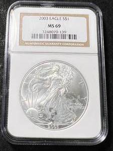 lot 11 image: 2003 AMERICAN SILVER EAGLE NGC MS69