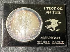 lot 42 image: 1992 AMERICAN SILVER EAGLE 1 TROY OZ .999 FINE SILVER IN CASE (TONED)