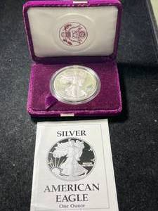 lot 57 image: 1990 PROOF AMERICAN SILVER EAGLE IN ORIGINAL MINT BOX