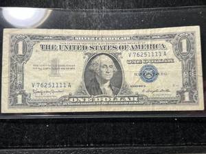 lot 65 image: 1957B US BLUE SEAL $1 SILVER CERTIFICATE
