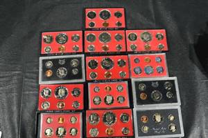 lot 233 image: United States Proof Sets - Assorted Years in Red Presentation Cases