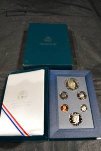 lot 238 image: United States Mint 1990 Prestige Set - Eisenhower Centennial Silver Dollar & 6-Coin Proof Set