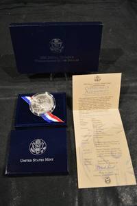 lot 241 image: United States Mint 1995 Special Olympics World Games Silver Dollar COA in Blue Box
