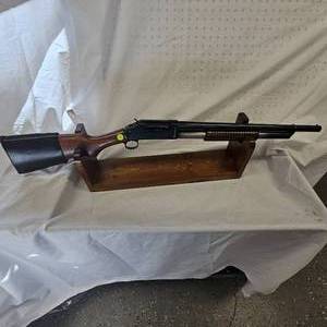 lot 35 image: Winchester 97 Copy, was built for SASS Competition