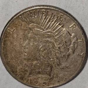 1922 S Peace Dollar $1 Fine, Gold Toning