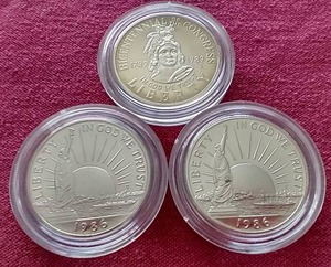 lot 12 image: (3) Commemorative Half Dollars