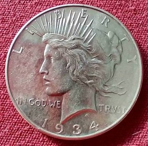 lot 30 image: Nice 1934 Peace Dollar - Tough Date